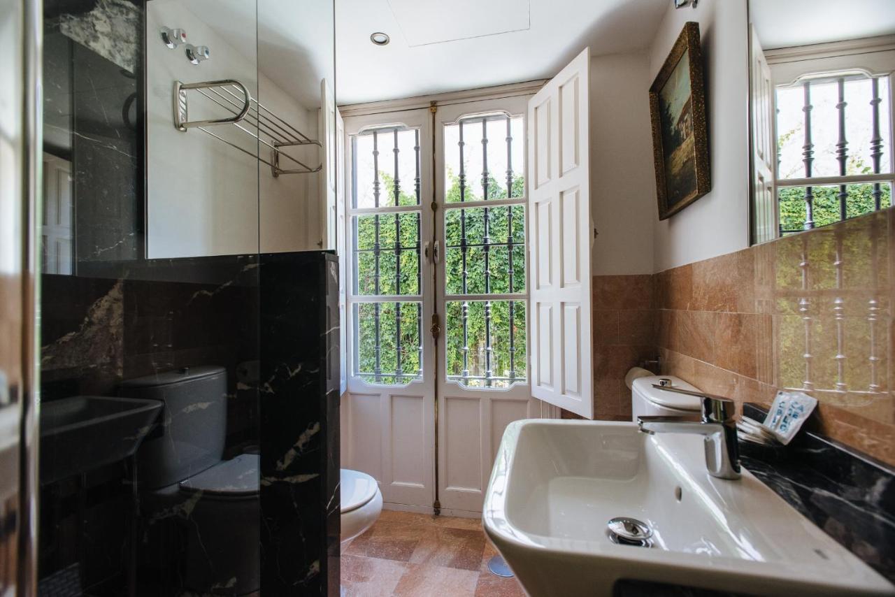 Vidrio Suite Apartment Sevilla Bagian luar foto